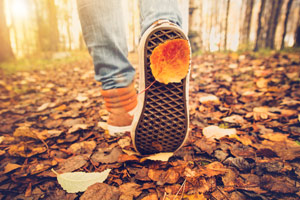 Walking-through-autumn-leaves